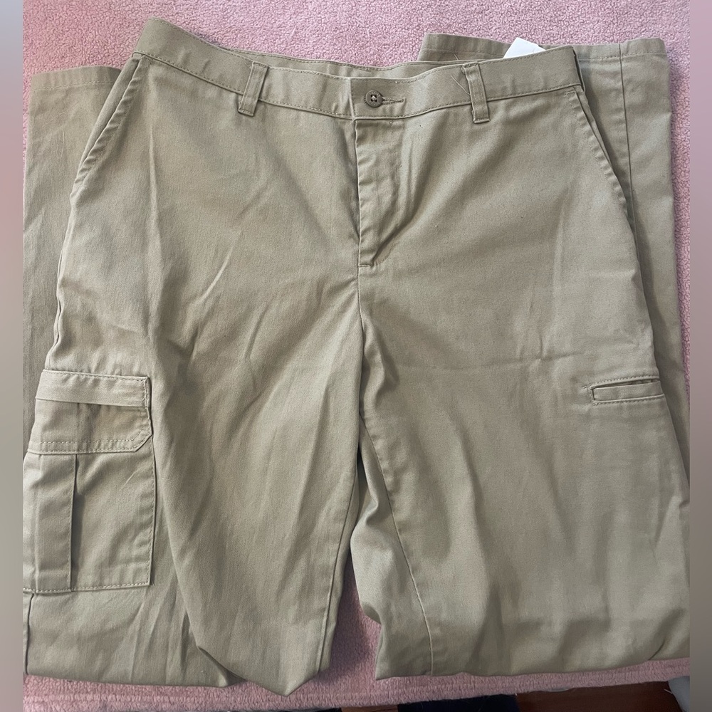 Khaki Dickies. Two pockets on either leg plus back pocket and side pockets